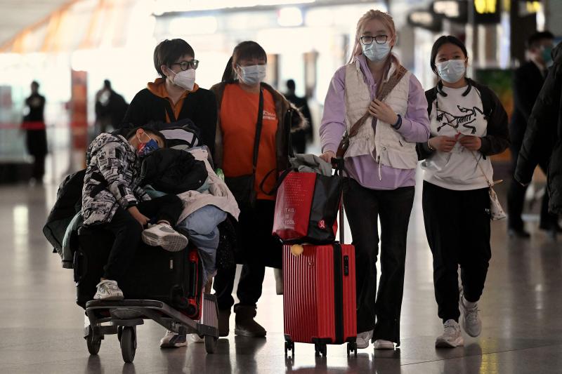 Ciudadanos chinos en el aeropuerto de Beijing. 